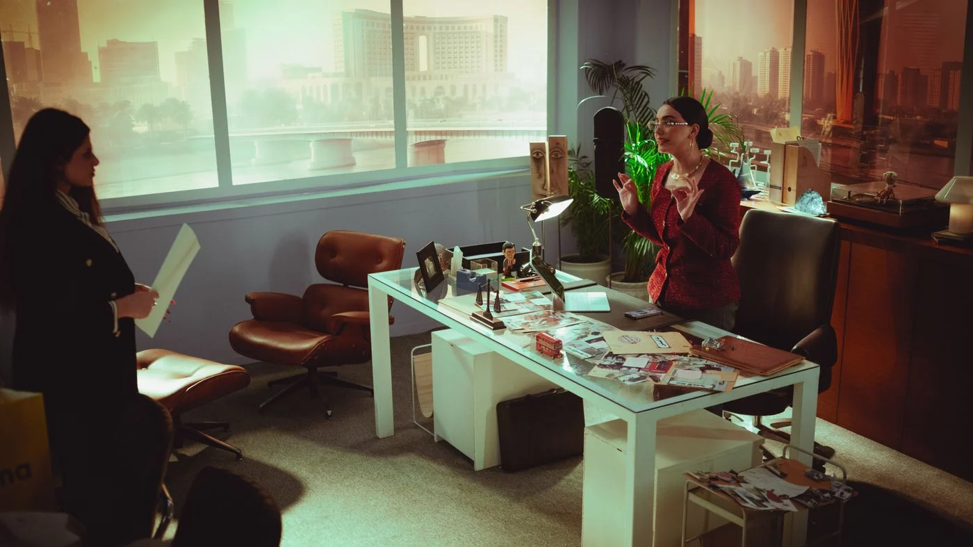 Illustrative scene of a professional meeting in a Baghdad office