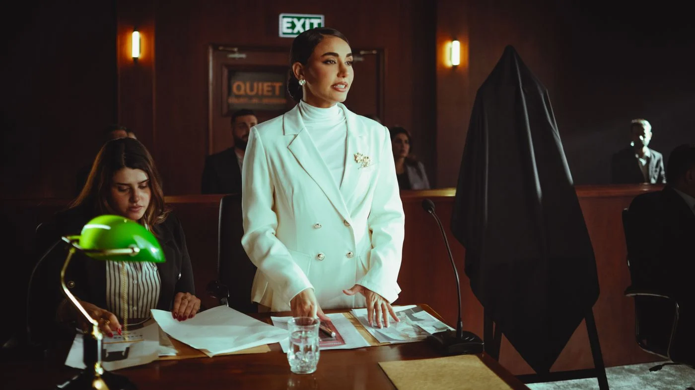 Illustrative scene of a woman lawyer speaking in a courtroom