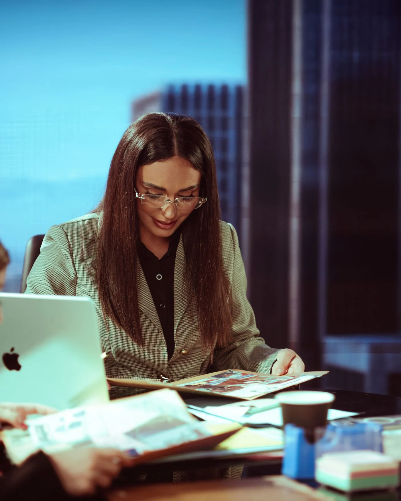 Illustrative scene of document review during a professional meeting